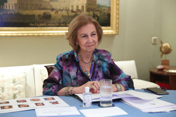 In this handout photo provided by Casa de S.M. El Rey Spanish Royal Household, Queen Sofia takes part in a video conference with members of 'Queen...