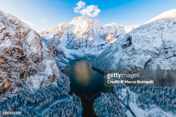mountain lake in the dolomites. aerial view - südtirol stock-fotos und bilder
