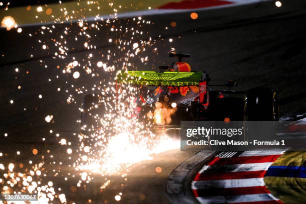 Sparks fly behind Max Verstappen of the Netherlands driving the Aston Martin Red Bull Racing RB16 during practice ahead of the F1 Grand Prix of...