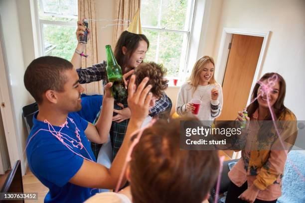 student party - college dorm party stock pictures, royalty-free photos & images