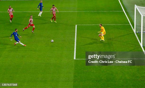 Hakim Ziyech of Chelsea scores their team's first goal past Jan Oblak of Atletico Madrid during the UEFA Champions League Round of 16 match between...