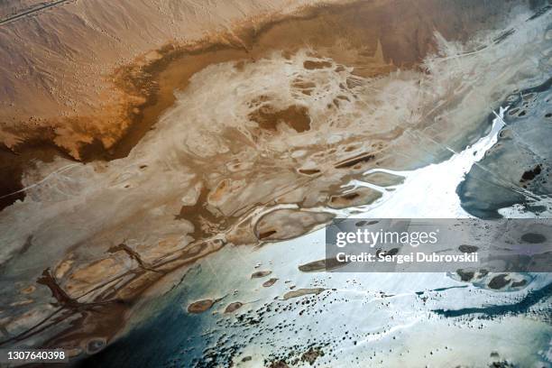 aerial view of small village in desert and road between mountains on sinai peninsula near sharm el sheikh, egypt - sharm al sheikh stock pictures, royalty-free photos & images