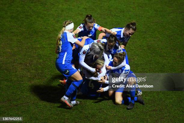 Ruby Mace of Birmingham City celebrates with teammates after scoring their team's second goal during the Barclays FA Women's Super League match...
