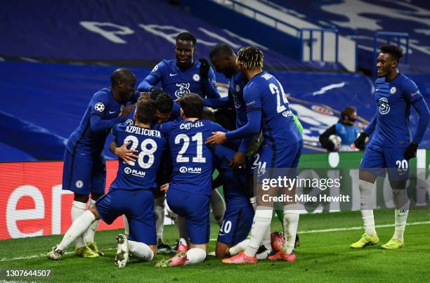 Emerson Palmieri of Chelsea celebrates with teammates after scoring their team's second goal during the UEFA Champions League Round of 16 match...