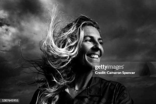 Australian surfer Stephanie Gilmore poses during a 'The Irukandjis' Australian surf team portrait session at Manly Beach on March 17, 2021 in Sydney,...