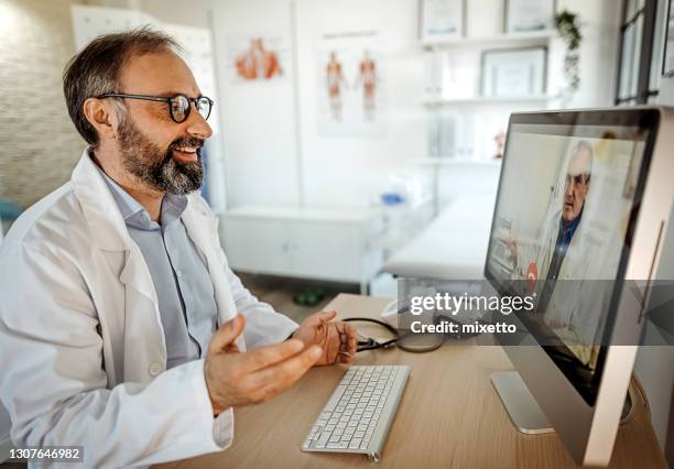 Male Gp Using Computer Photos and Premium High Res Pictures - Getty Images