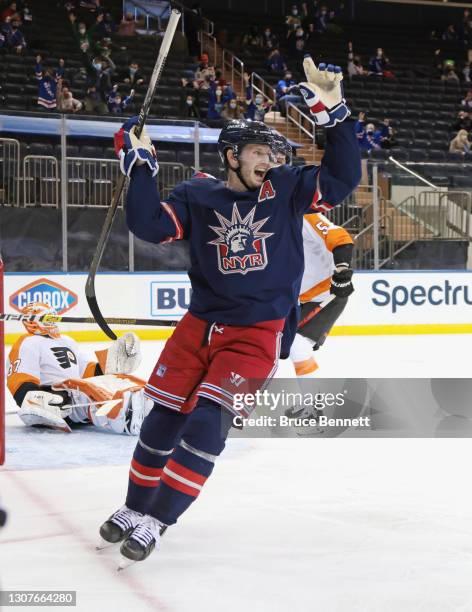 Jacob Trouba of the New York Rangers celebrates a goal by Pavel Buchnevich at 3:38 of the second period against the Philadelphia Flyers at Madison...