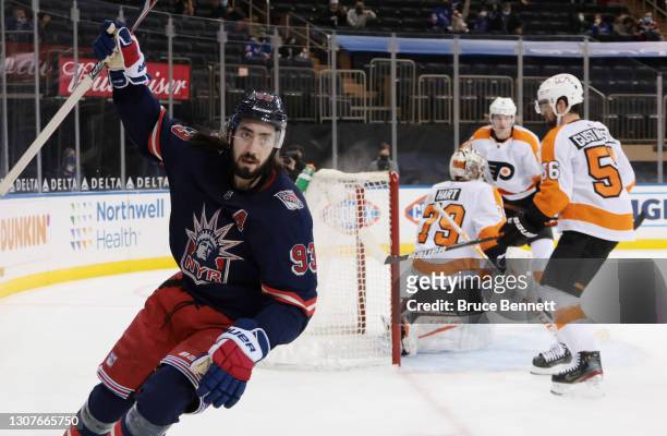 Mika Zibanejad of the New York Rangers celebrates his power-play goal at 14:29 of the second period against Carter Hart of the Philadelphia Flyers at...