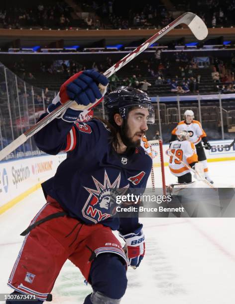 Mika Zibanejad of the New York Rangers celebrates his power-play goal at 14:29 of the second period against Carter Hart of the Philadelphia Flyers at...