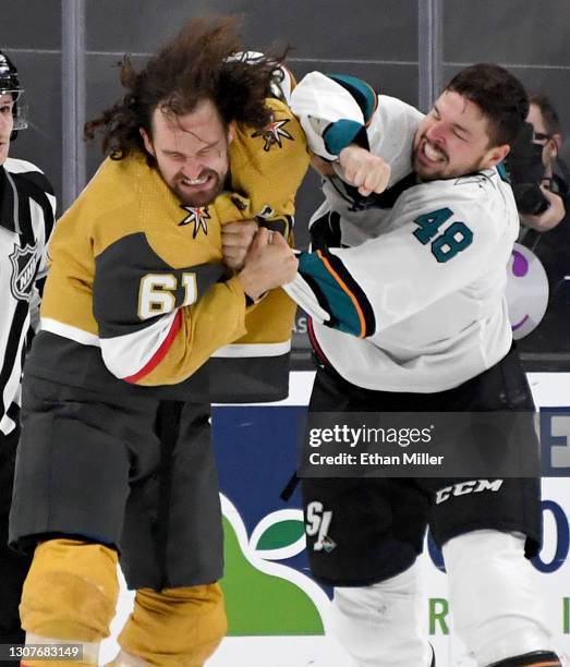 Mark Stone of the Vegas Golden Knights and Tomas Hertl of the San Jose Sharks fight in the third period of their game at T-Mobile Arena on March 17,...