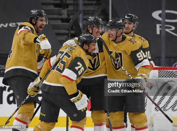 Nicolas Hague, Ryan Reaves, Zach Whitecloud, Tomas Nosek and Nicolas Roy celebrate after Nosek and Whitecloud assisted Reaves on a third-period goal...