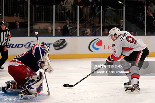 Milan Michalek of the Ottawa Senators scores the winning goal in the shoot out against the New York Rangers at Madison Square Garden on October 29,...