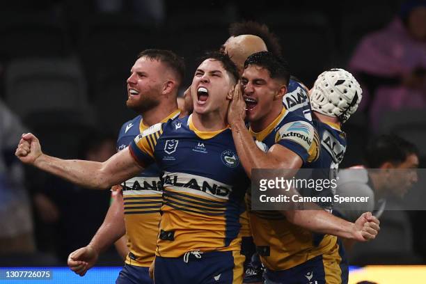 Mitchell Moses of the Eels celebrates after Maika Sivo of the Eels scores a try during the round two NRL match between the Parramatta Eels and the...