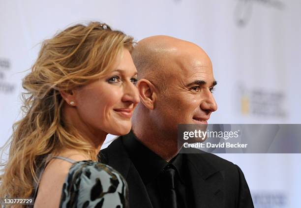 Former tennis player Steffi Graf and former tennis player Andre Agassi arrive at the Andre Agassi Foundation for Education's 16th Grand Slam for...