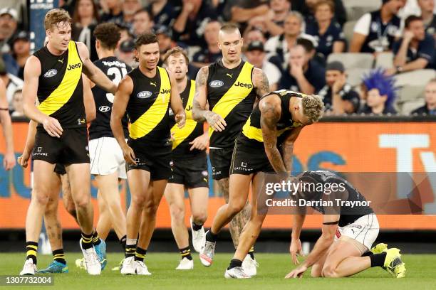 Shai Bolton of the Tigers celebrates a goal while taunting Sam Docherty of the Blues during the round one AFL match between the Richmond Tigers and...