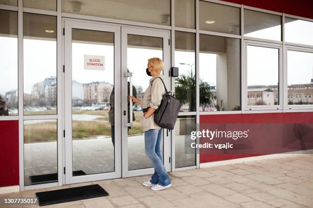 blood bank entrance - entering hospital stock pictures, royalty-free photos & images