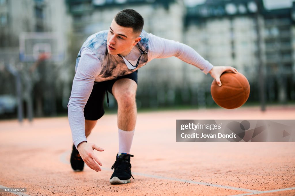 Portrait of young basketball player