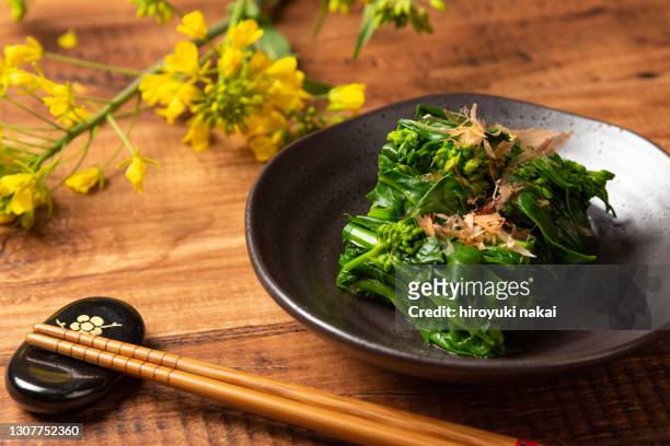 pickled rapeseed - geköchelt stock-fotos und bilder