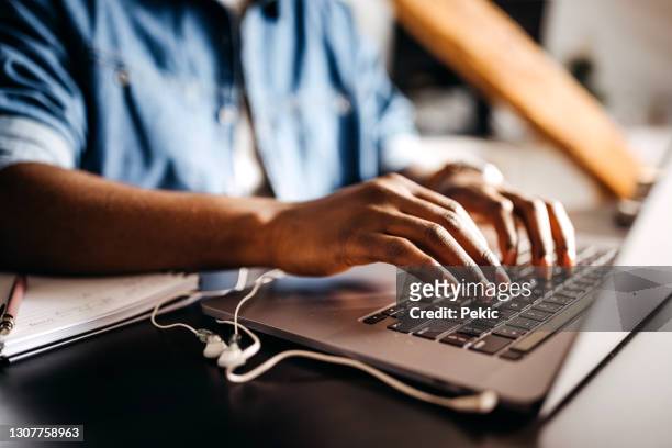 entrepreneur working on laptop online - human body part stock pictures, royalty-free photos & images