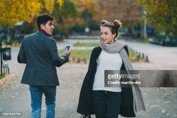 man losing mind on seeing an attractive woman - sideways glance stock pictures, royalty-free photos & images
