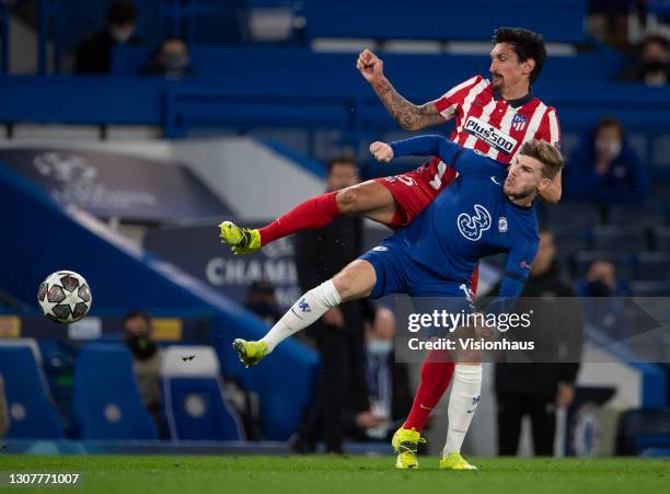 Timo Werner of Chelsea and Stefan Savic of Atletico Madrid during the UEFA Champions League Round of 16 match between Chelsea FC and Atletico Madrid...