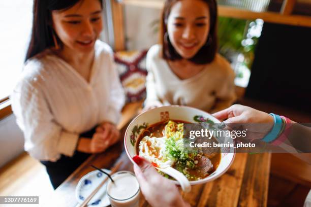 waitress serving dishes - pho stock pictures, royalty-free photos & images