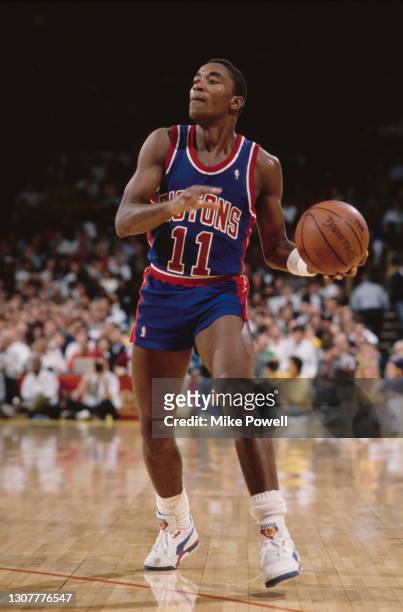 Isiah Thomas, Point Guard for the Detroit Pistons dribbles the basketball down court during the NBA Pacific Division basketball game against the Los...