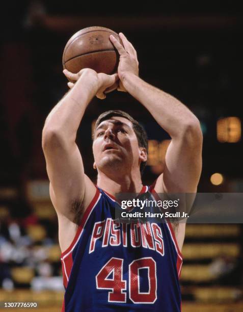 Bill Laimbeer, Center for the Detroit Pistons attempts to shoot a free throw during the NBA Pre Regular Season basketball game against the New Jersey...