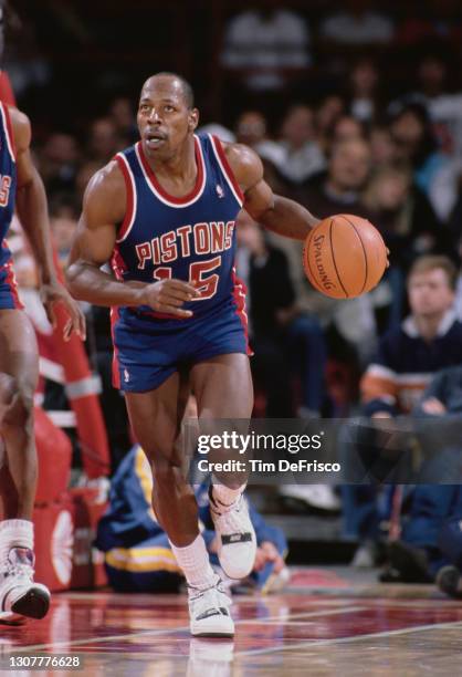 Vinnie Johnson, Shooting Guard and Point Guard for the Detroit Pistons dribbles the basketball down court during the NBA Midwest Division basketball...