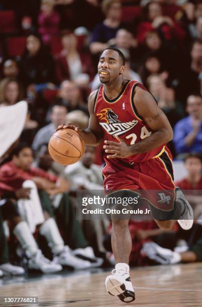 Mateen Cleaves, Point Guard for the Detroit Pistons dribbles the basketball down court during the NBA Midwest Division basketball game against the...