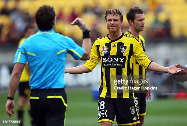 Ben Sigmund of the Phoenix questions referee Peter Green during the round four A-League match between Wellington Phoenix and Melbourne Victory at...