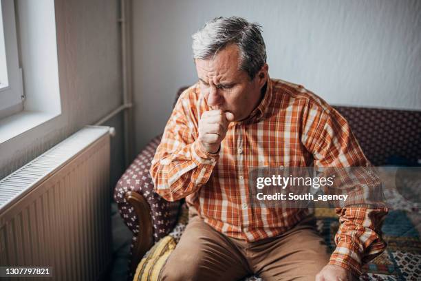 ill senior man coughing - old cough stock pictures, royalty-free photos & images