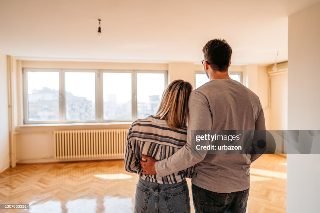 Young couple in their new home