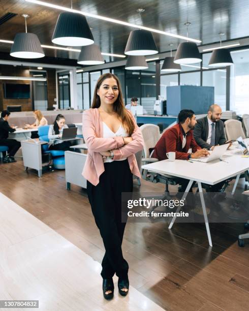businesswoman portrait in modern office - mexican business women stock pictures, royalty-free photos & images