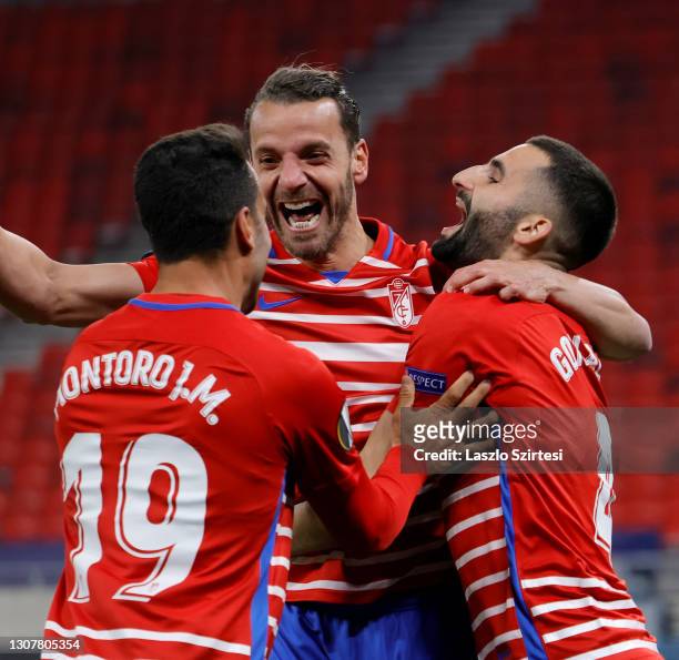 Roberto Soldado of Granada CF celebrates his goal with teammates during the UEFA Europa League Round of 16 Second Leg match between Molde and Granada...