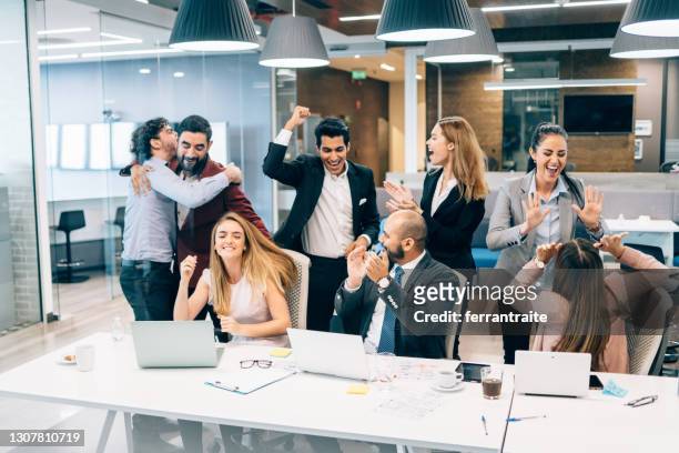 business team celebration - launch event stock pictures, royalty-free photos & images