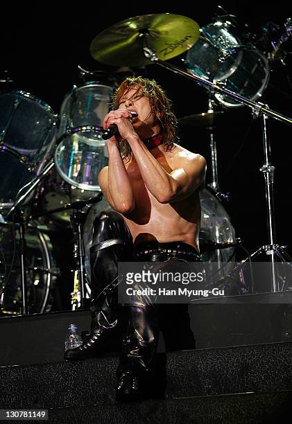 Japanese Singer Yoshiki of the band X Japan performs live during a concert at Olympic Gymnasium on October 28, 2011 in Seoul, South Korea.