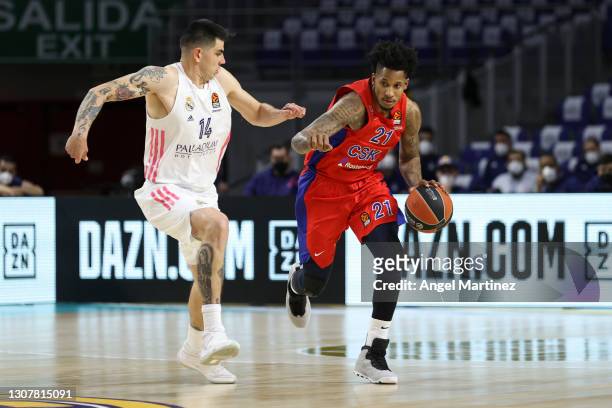 Will Clyburn, #21 of CSKA Moscow competes with Gabriel Deck, #14 of Real Madrid during the 2020/2021 Turkish Airlines EuroLeague Regular Season Round...