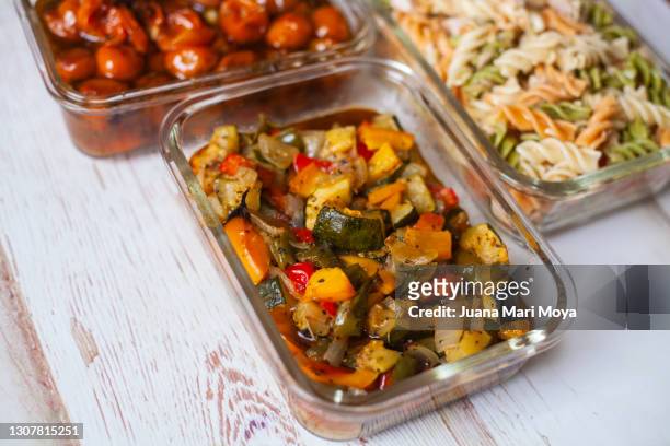hermetic glass containers of cooked food.  concept of batch-cooking - container stock pictures, royalty-free photos & images