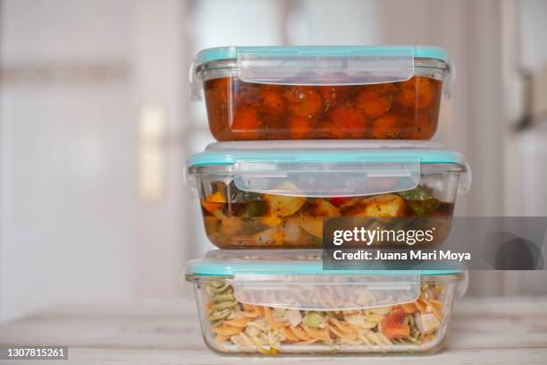 hermetic glass containers of cooked food.  concept of batch-cooking - sotto vuoto foto e immagini stock