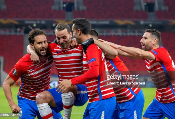 Roberto Soldado of Granada CF celebrates his goal with teammates during the UEFA Europa League Round of 16 Second Leg match between Molde and Granada...