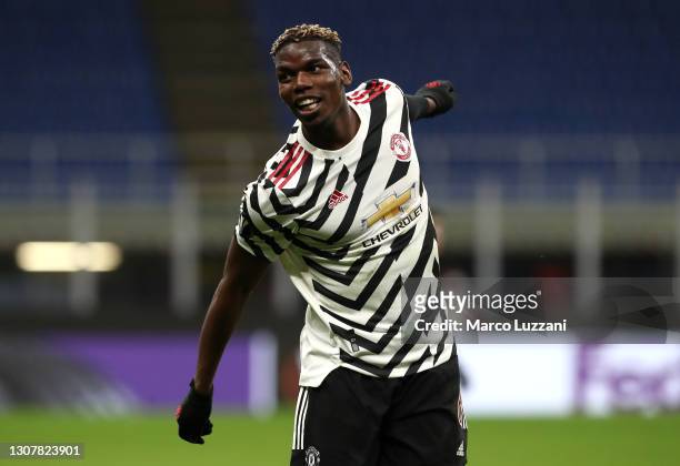 Paul Pogba of Manchester United reacts during the UEFA Europa League Round of 16 Second Leg match between AC Milan and Manchester United at San Siro...