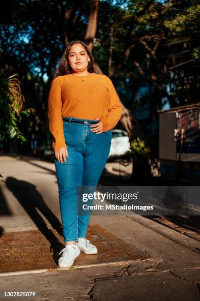 young confident woman - plus size fashion model stock pictures, royalty-free photos & images