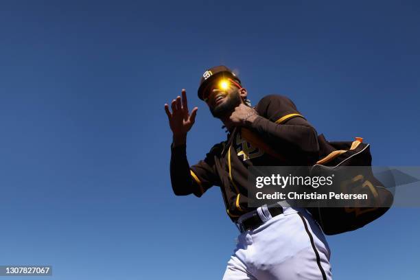 Fernando Tatis Jr. #23 of the San Diego Padres walks to the dugout before the MLB spring training game against the Oakland Athletics at Peoria Sports...