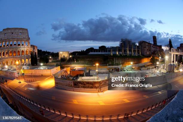 The Arch of Constantine, the Colosseum and and Palatine Hill are shown during restoration work on March 18, 2021 in Rome, Italy. The Flavian...