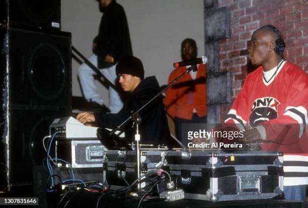 Rap Group Onyx's Sonny Seeza plays DJ on a turntable in a club on April 10, 1994 in New York City.