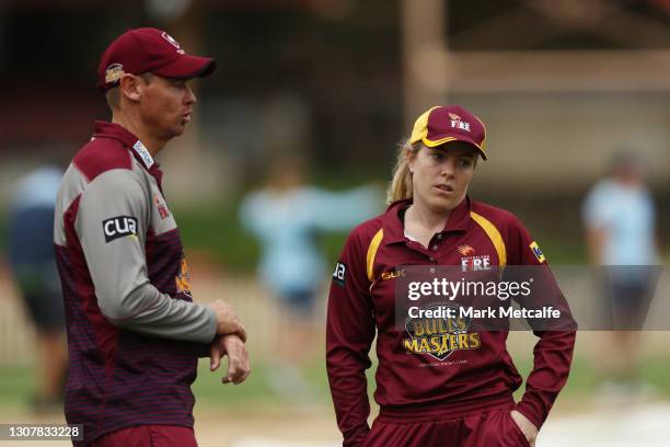 Fire head coach Ashley Noffke talks to Georgia Redmayne of the Fire before the WNCL match between New South Wales and Queensland at North Sydney Oval...