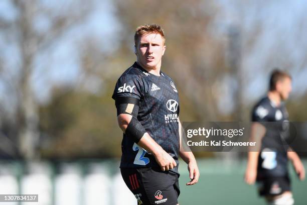 Fletcher Newell looks on during a Crusaders Super Rugby Aotearoa training session at Rugby Park on March 19, 2021 in Christchurch, New Zealand.