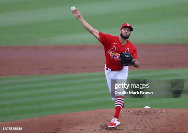 Daniel Ponce de Leon of the St. Louis Cardinals delivers a pitch in the first inning against the Miami Marlins in a spring training game at Roger...