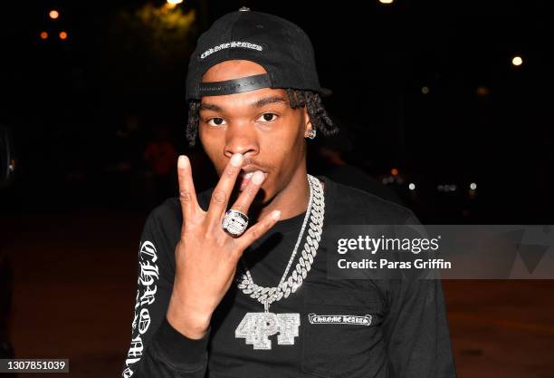 Rapper Lil Baby attends his "Trapper of the Year" Exhibit at Trap Music Museum on March 10, 2021 in Atlanta, Georgia.